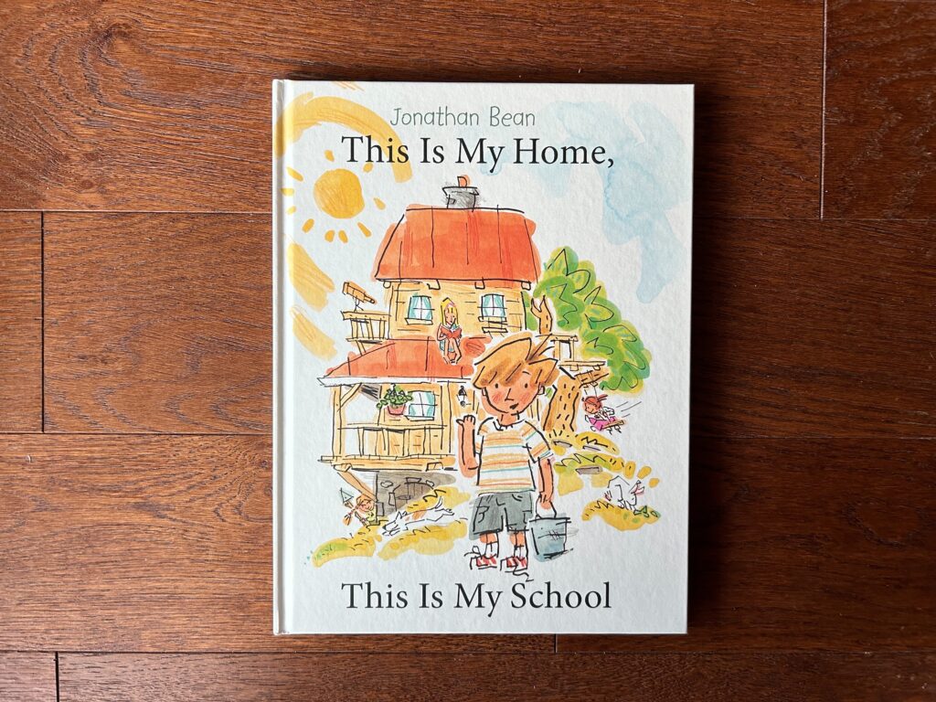 Picture book This is My Home This is My School by Jonathan Bean. Illustrated house with child outside.