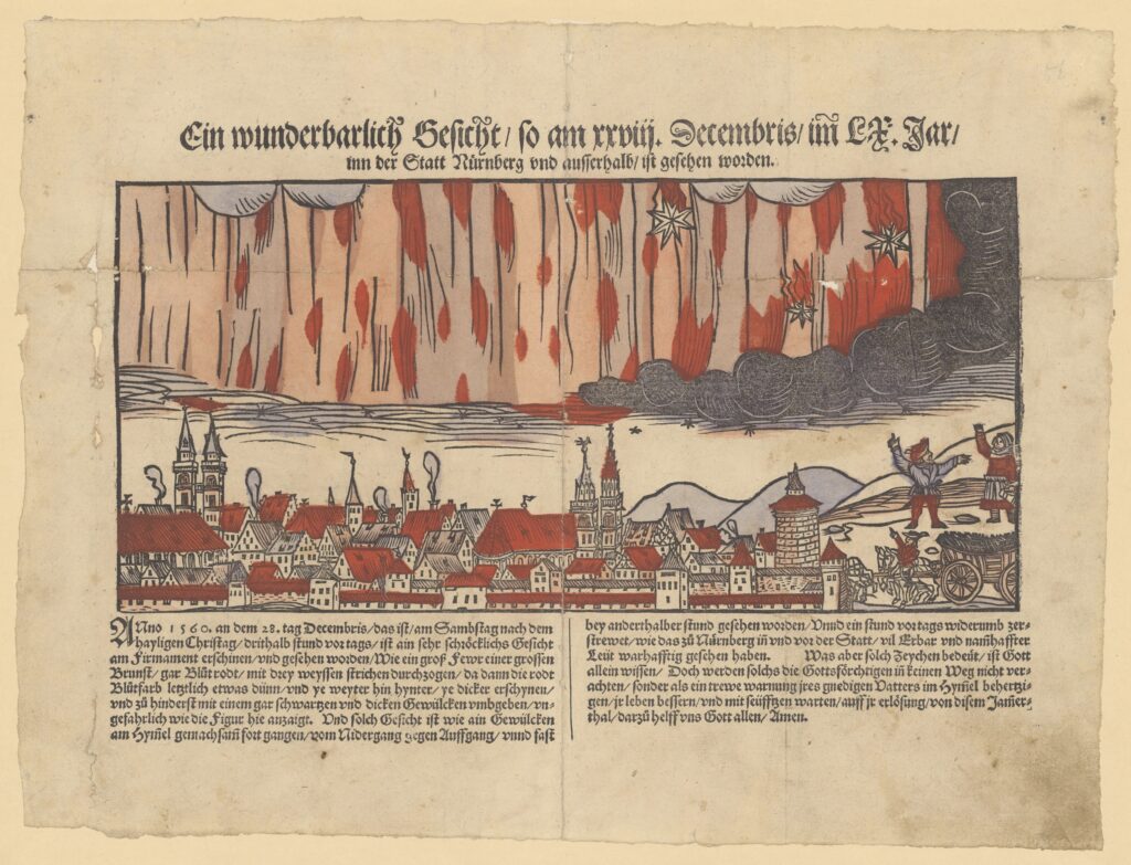 16th century woodcut broadsheet illustration of red sky above a city