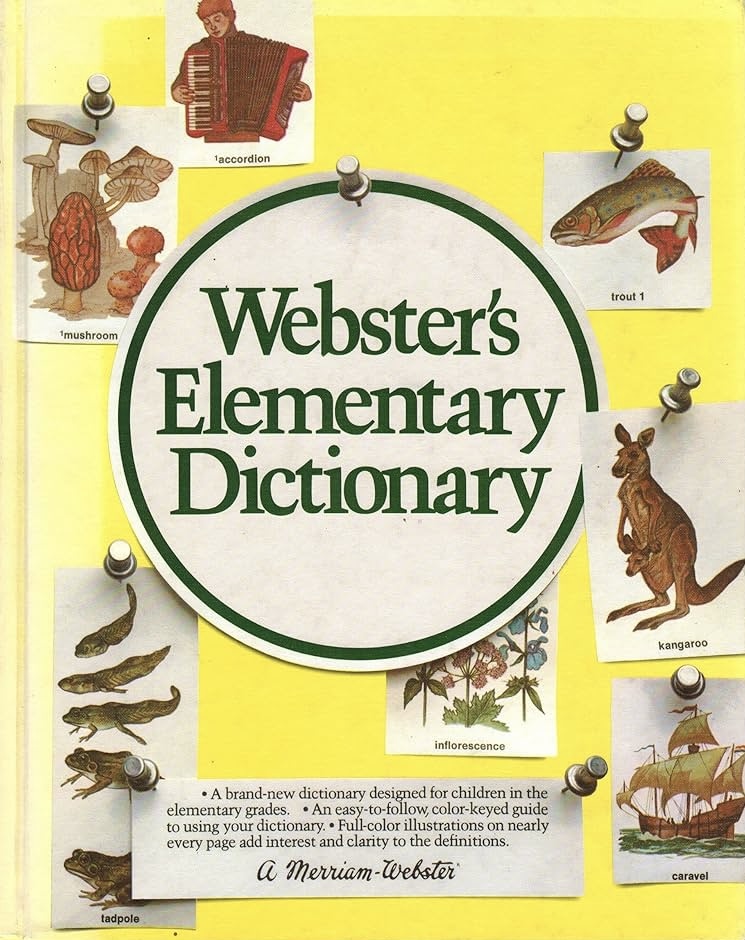 Webster's Elemetary Dictionary yellow cover with push pins 