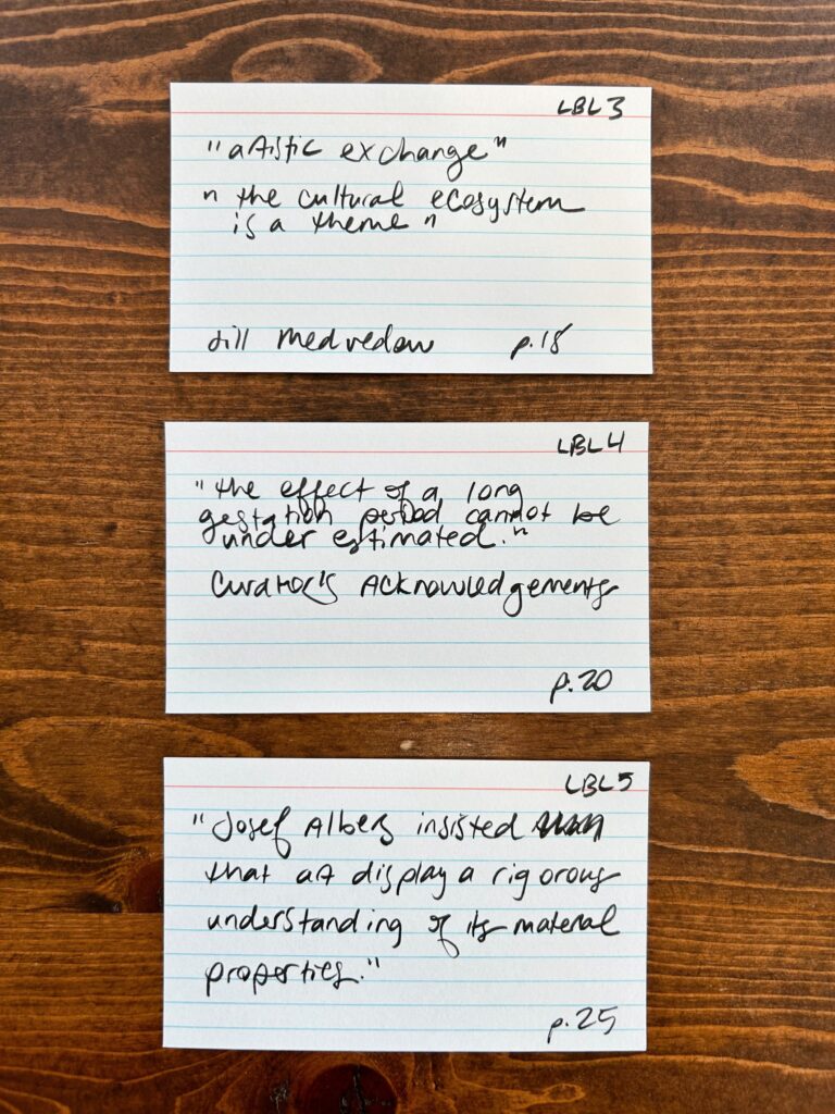 Handwritten index cards. Quotes typed below.