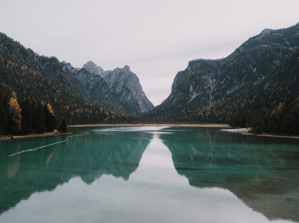 Mountains reflecting into a blue green lake