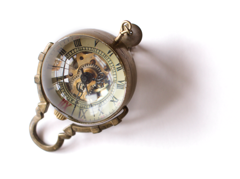 Spherical pocket watch on a white background