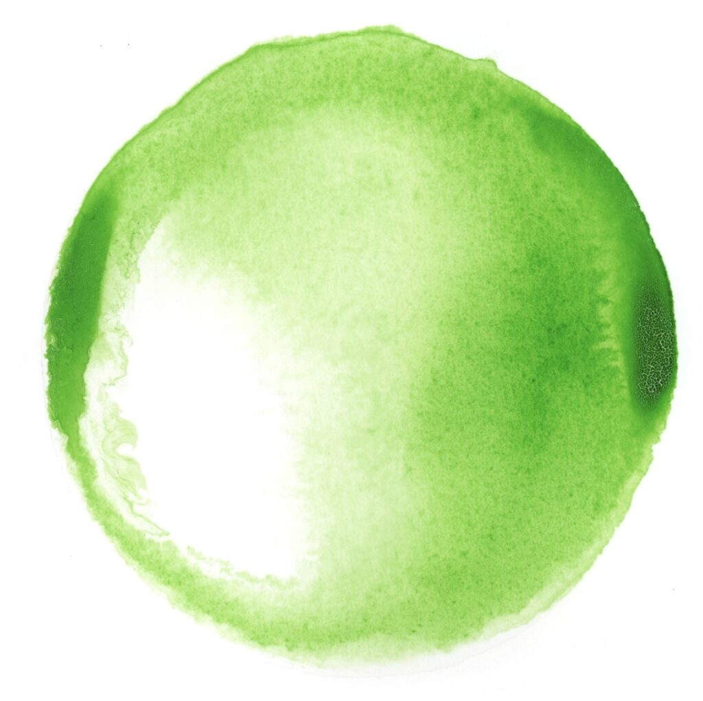 Bright green ink wash in a circle darker on edges and fading to white left of center.