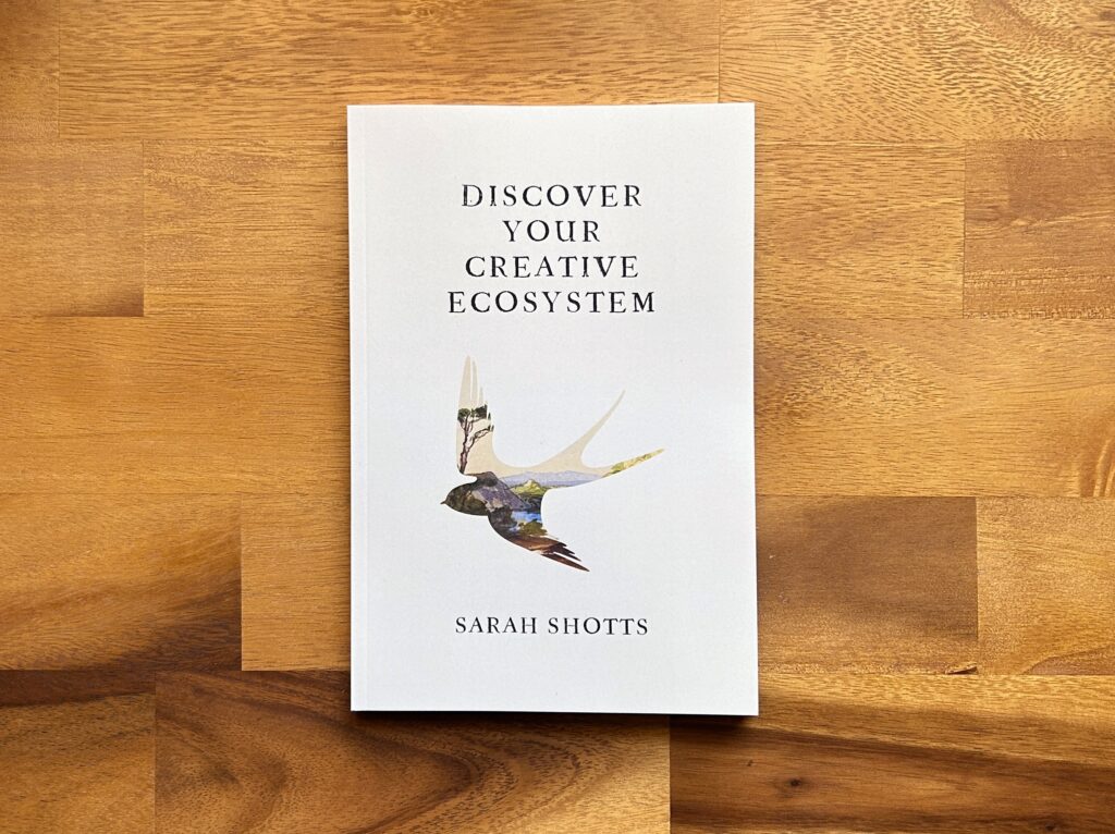 Discover Your Creative Ecosystem book by Sarah Shotts. A silhouette of bird in flight shows a landscape beyond.