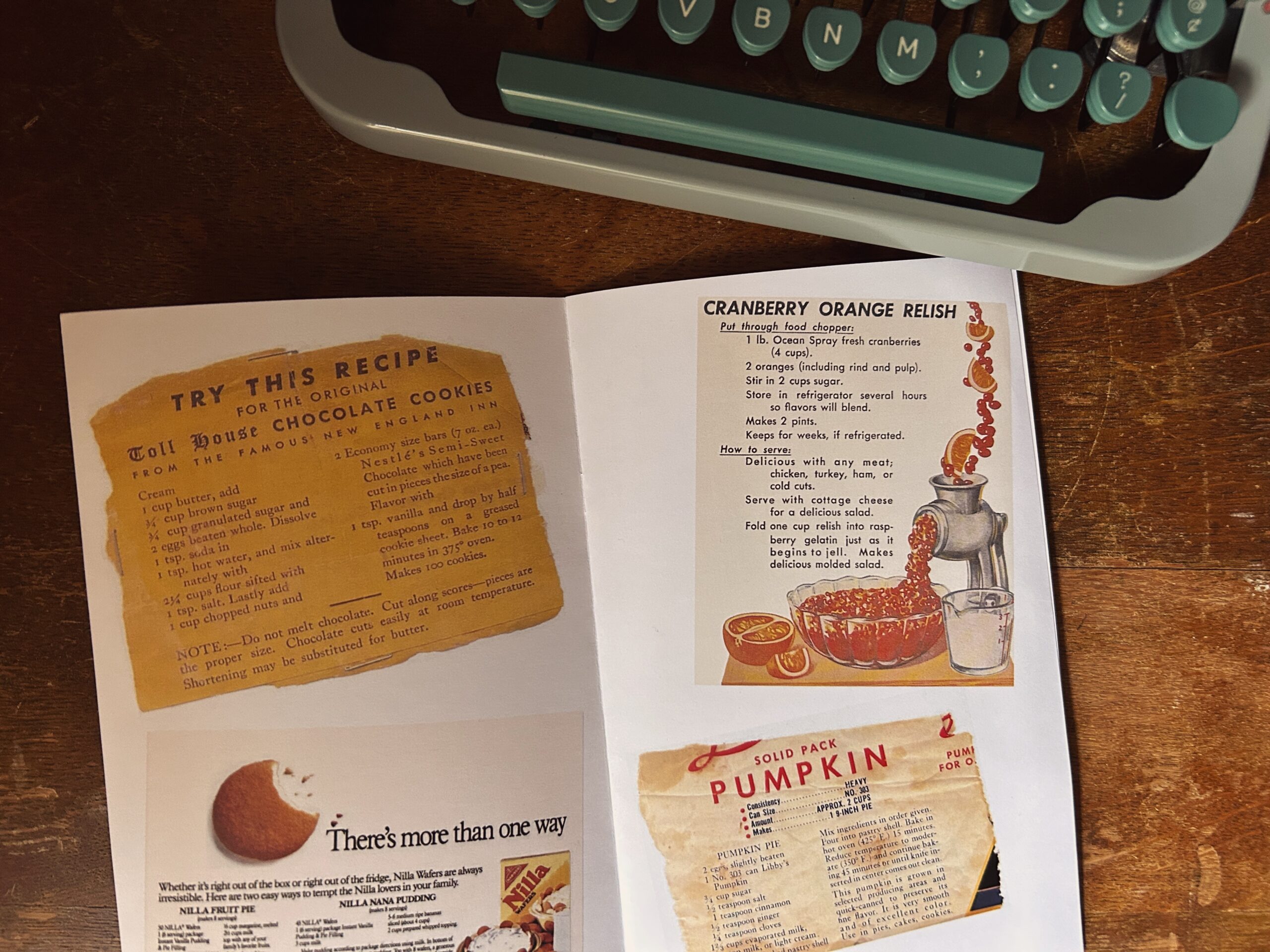 Festive recipe zine by my green typewriter. Recipes shown are Tollhouse cookies, Banana pudding, cranberry relish and Libby's pumpkin pie. Text is too small to read.