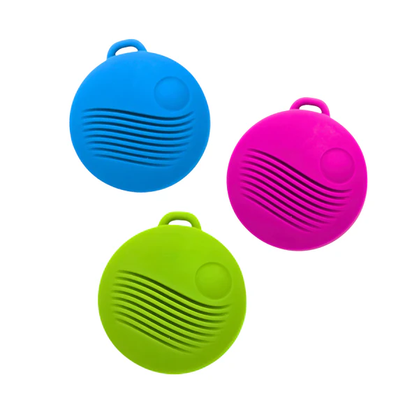 Three circular silicone pendants in blue, pink, and green.